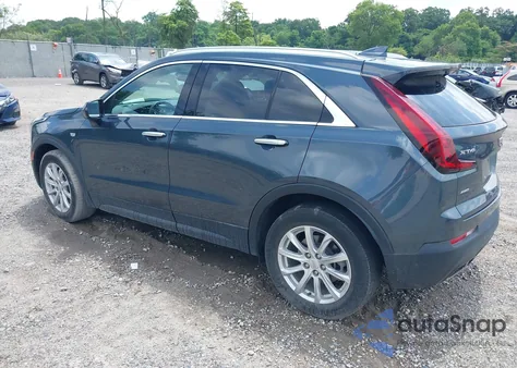 2021 Cadillac Xt4 Awd Luxury from USA, damaged, VIN 1GYFZBR48MF058078